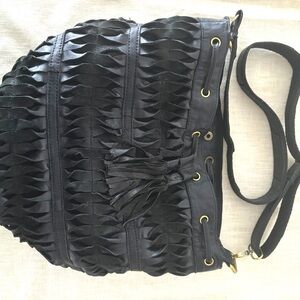 Black leather Lost & Found Brand bucket bag.